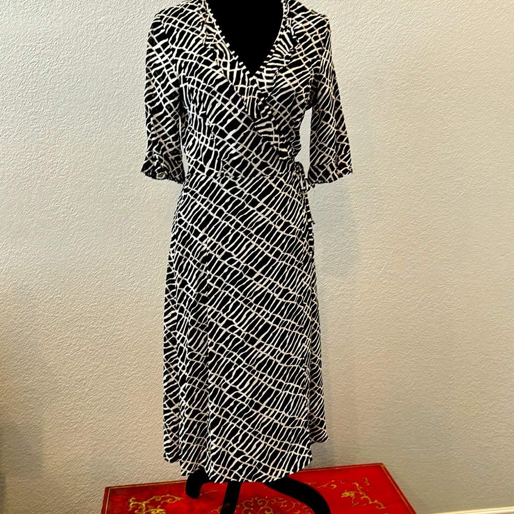 Hugo Buscati wrap-around print dress with separate black slip.